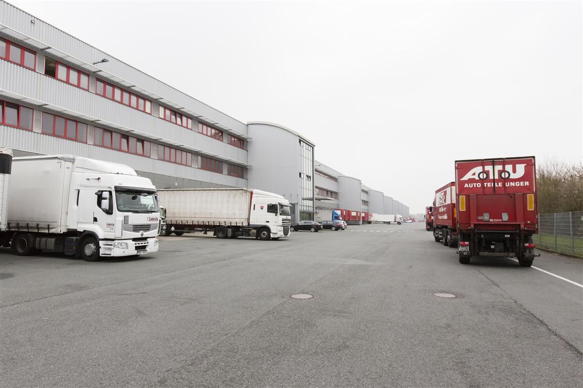 Exterior of warehouse with trucks in view