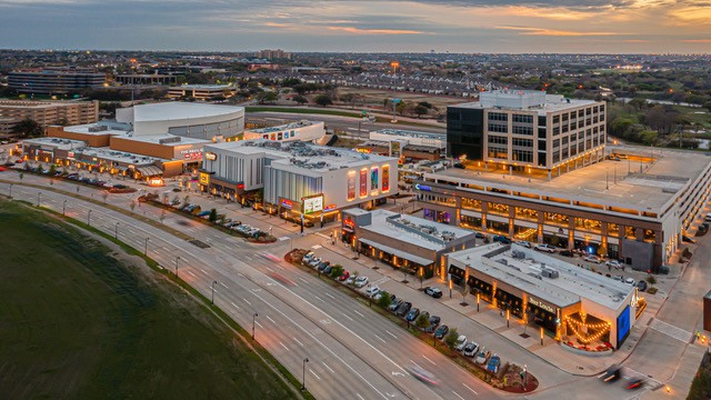 Toyota Music Factory aerial view of the entire block at dusk.