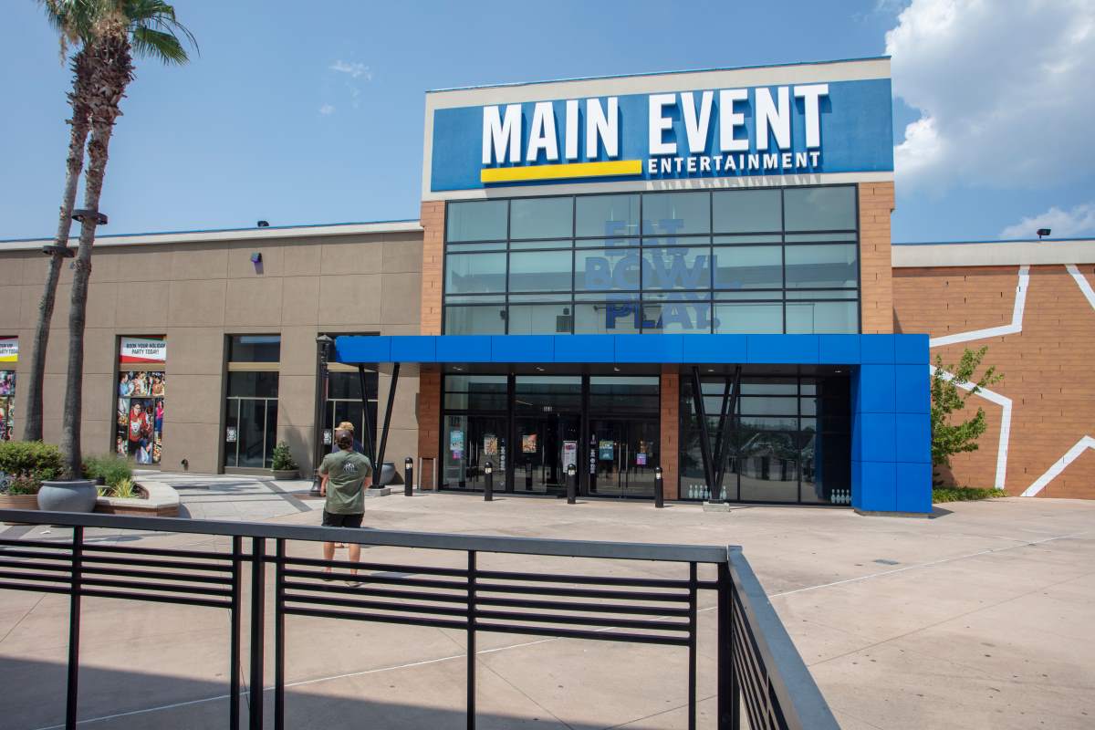 Outside at the center showing Main Event Entertainment store front