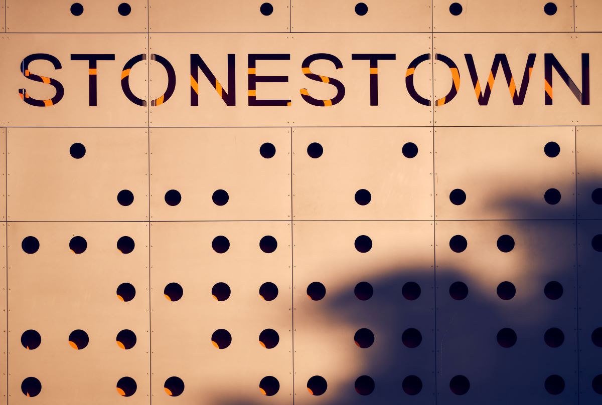 Stonestown sign on exterior of mall