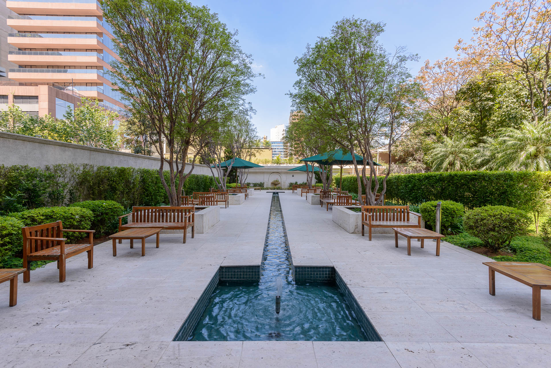JK 1455 fountain outdoor with benches at the perimeter of the common area