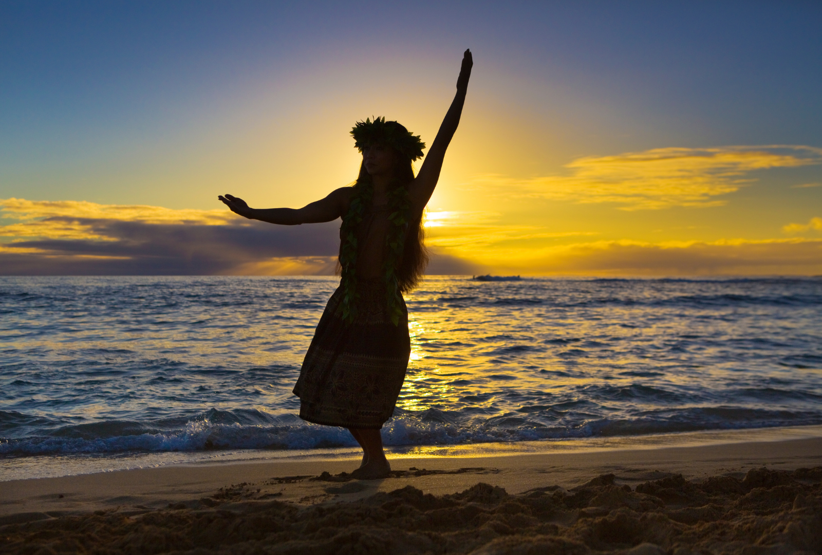 girl dancing hula on beach