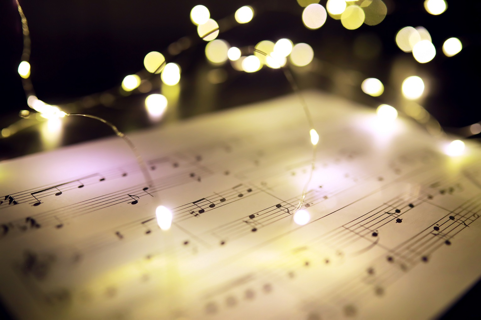 sheet music with white lights
