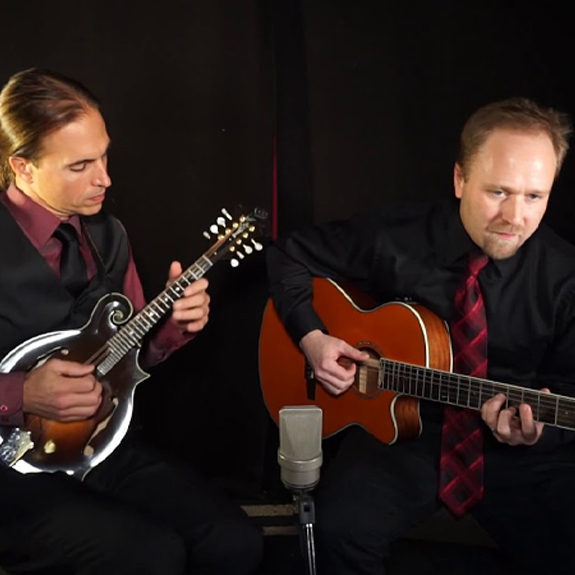 Two people performing music